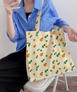 ساک خرید پارچه ای کرمی با طرح پرتقال